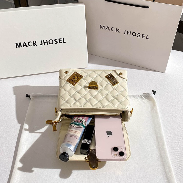 Handheld bag with diamond pattern, small badge, box, 2023, Chanel style