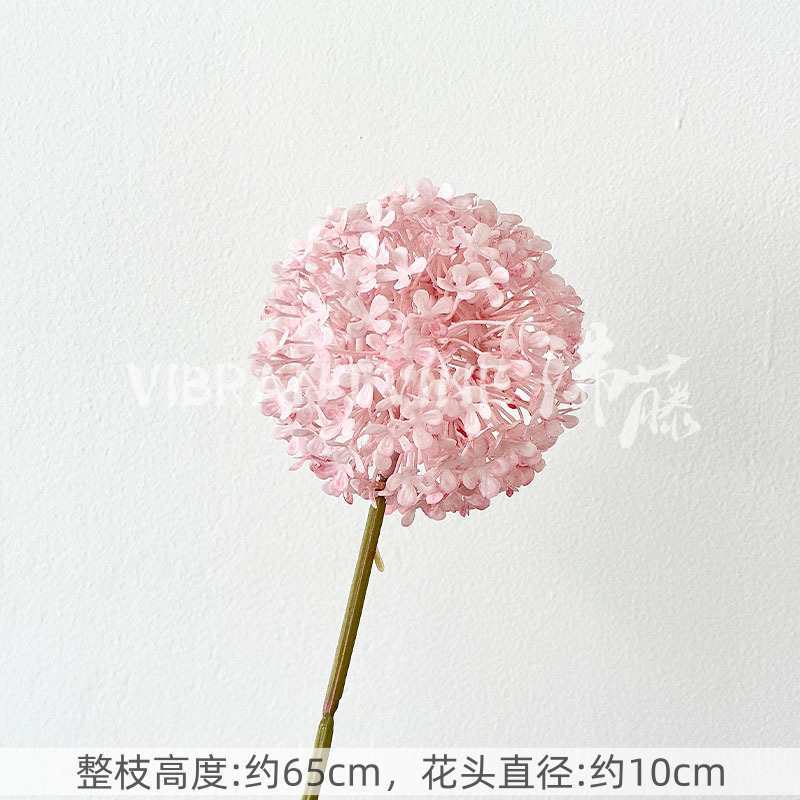 ピンク系のシミュレーション花の結婚式場は造景の偽の花の背景の壁を配置して花の天井の花の路を飾って生け花の娟花を導いています。