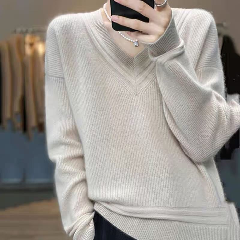 2025 otoño y invierno nuevo suéter de punto de cuello V suelto y perezoso para mujeres de color sólido con camiseta de fondo grande de aire extranjero gruesa