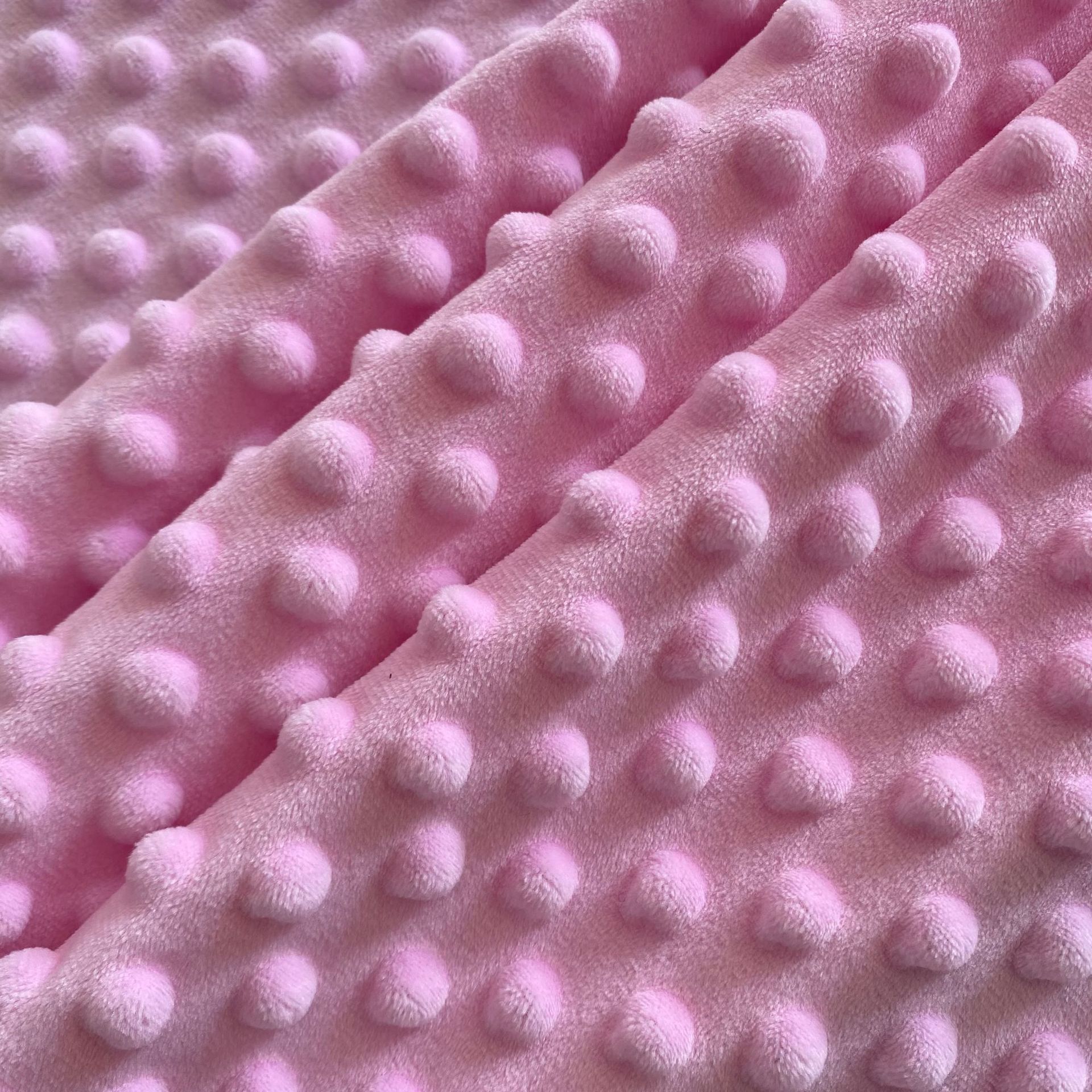 厂家供应 超柔 水晶超柔压泡布 豆豆绒童毯家纺面料 服装童装里布