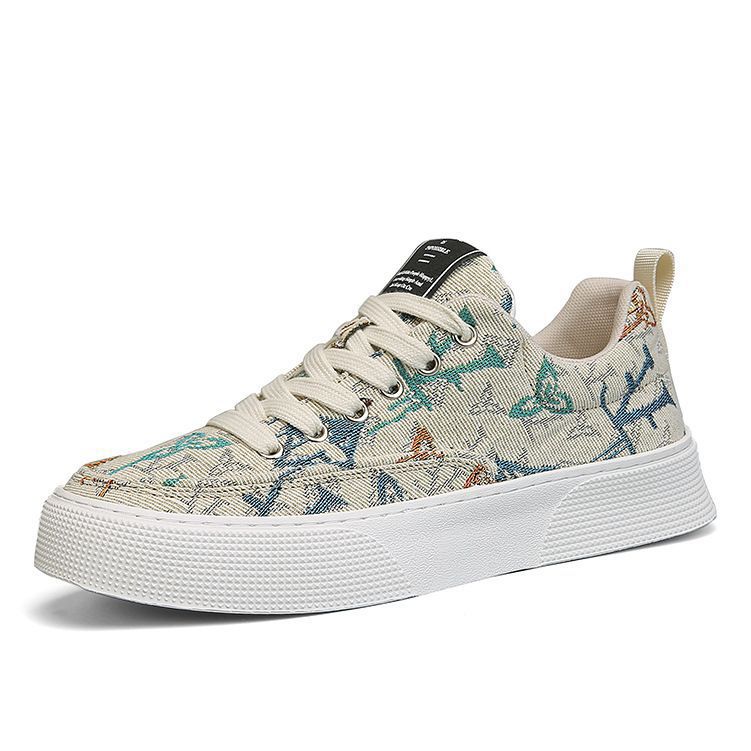 Zapatos de hombre otoño 2025 nuevos zapatos de lona transpirables de moda coreana con suela suave ligera, zapatos de altura baja para hombre