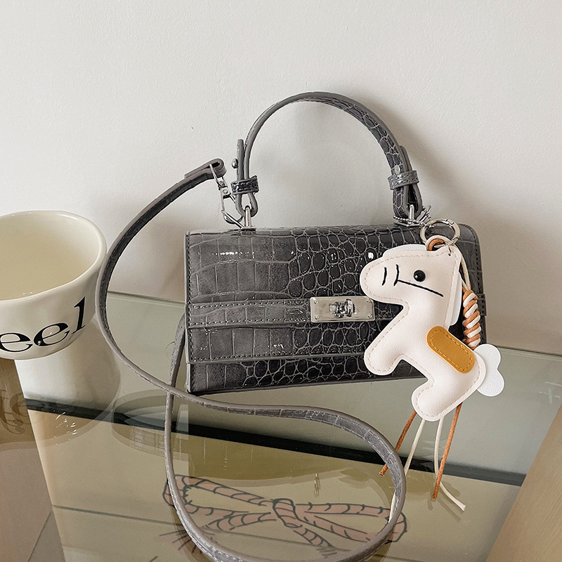Texturas de alta calidad de moda de cocodrilo Kelly bolso de mano pequeño bolso cuadrado para mujeres nuevas ventas calientes de moda de lujo ligero mochila