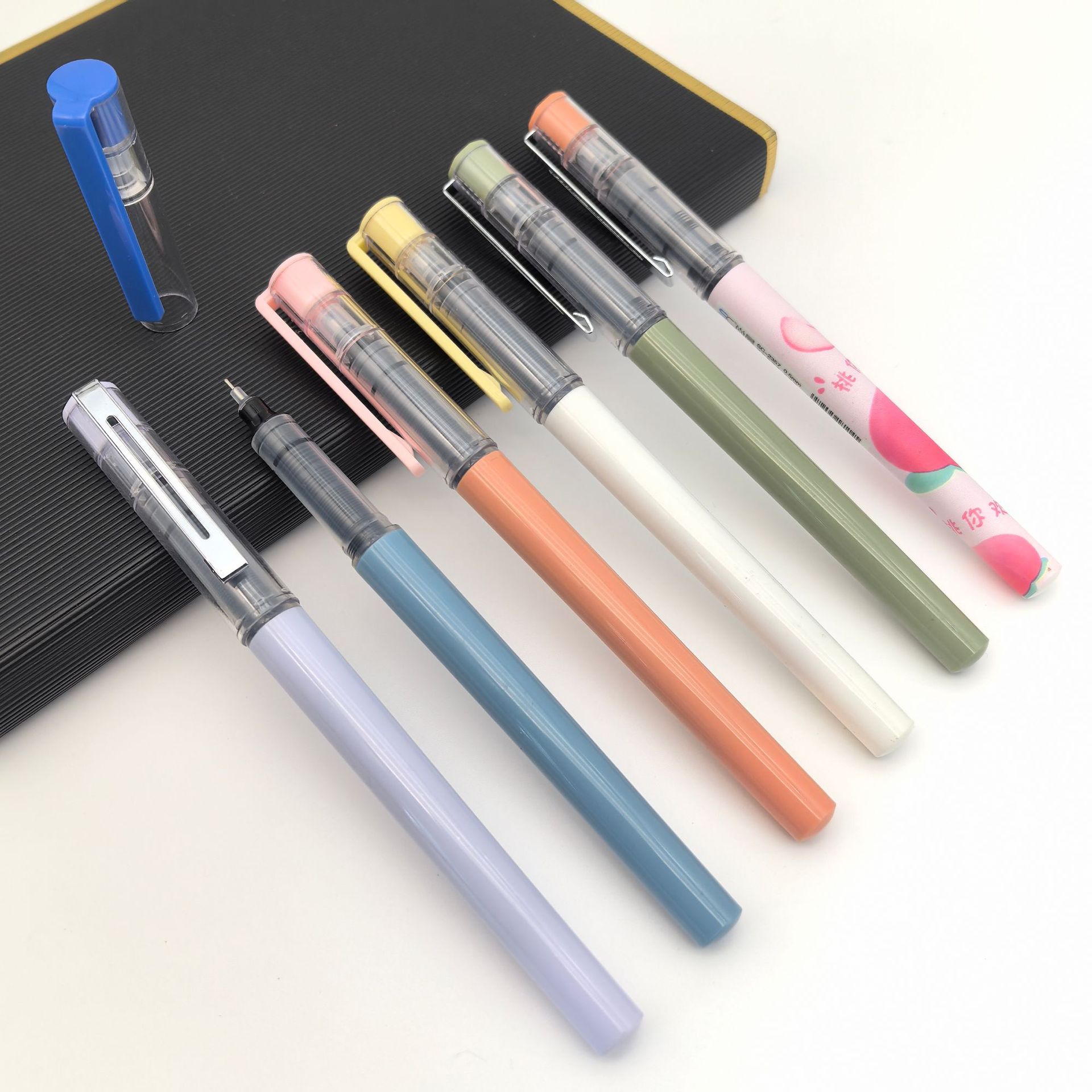 Bolígrafo líquido directo de gran capacidad 0.5 bolígrafo neutro de velocidad de secado de tinta continua puede personalizar bolígrafo neutro de transferencia de calor para estudiantes