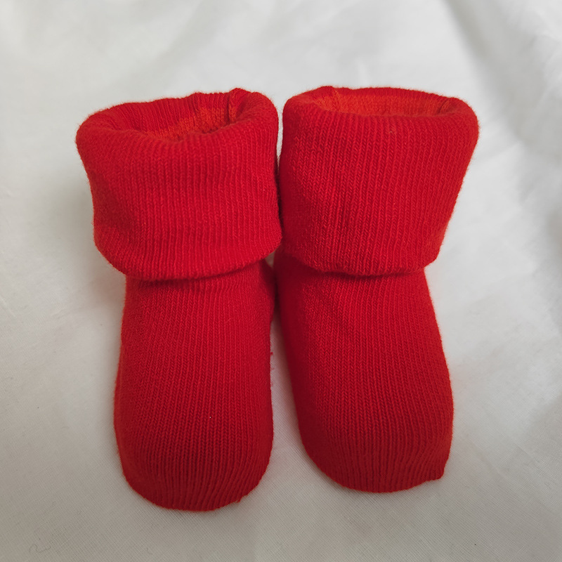 Hombres y mujeres recién nacidos, bebés, niños pequeños, una clase de algodón peinado, otoño e invierno, más calcetines rojos cálidos y gruesos de terciopelo