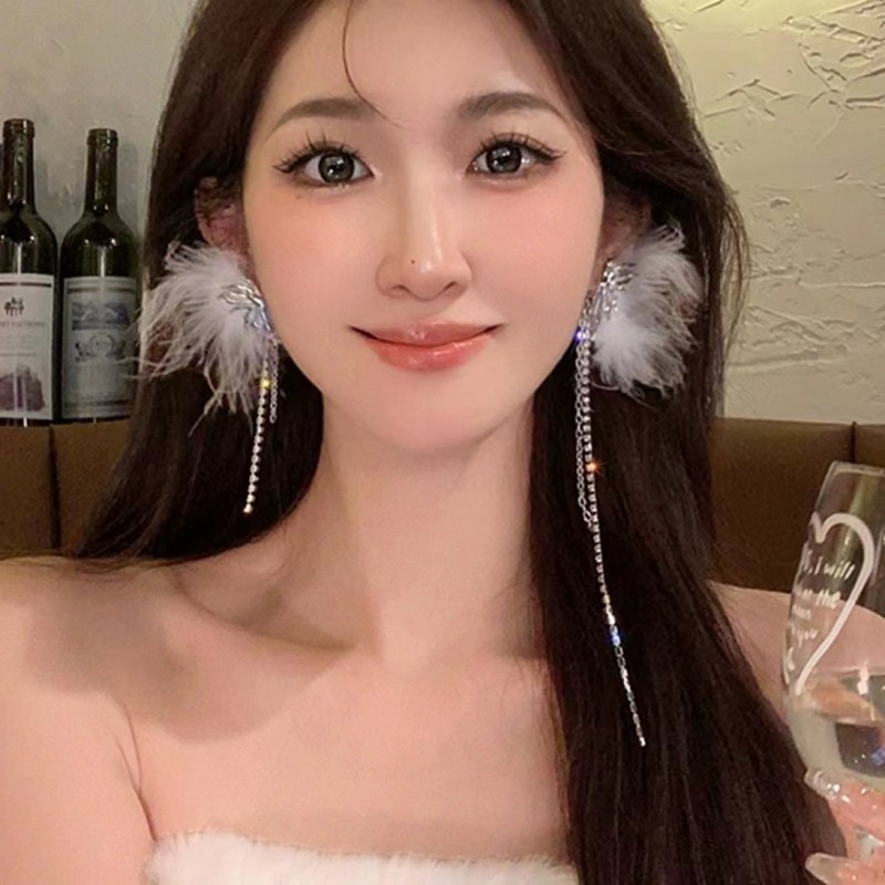Cute asymmetrical elegant fashionable earrings with tassels