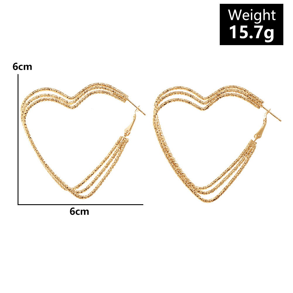 simple geometric heart simple long peach heartshaped earringspicture2