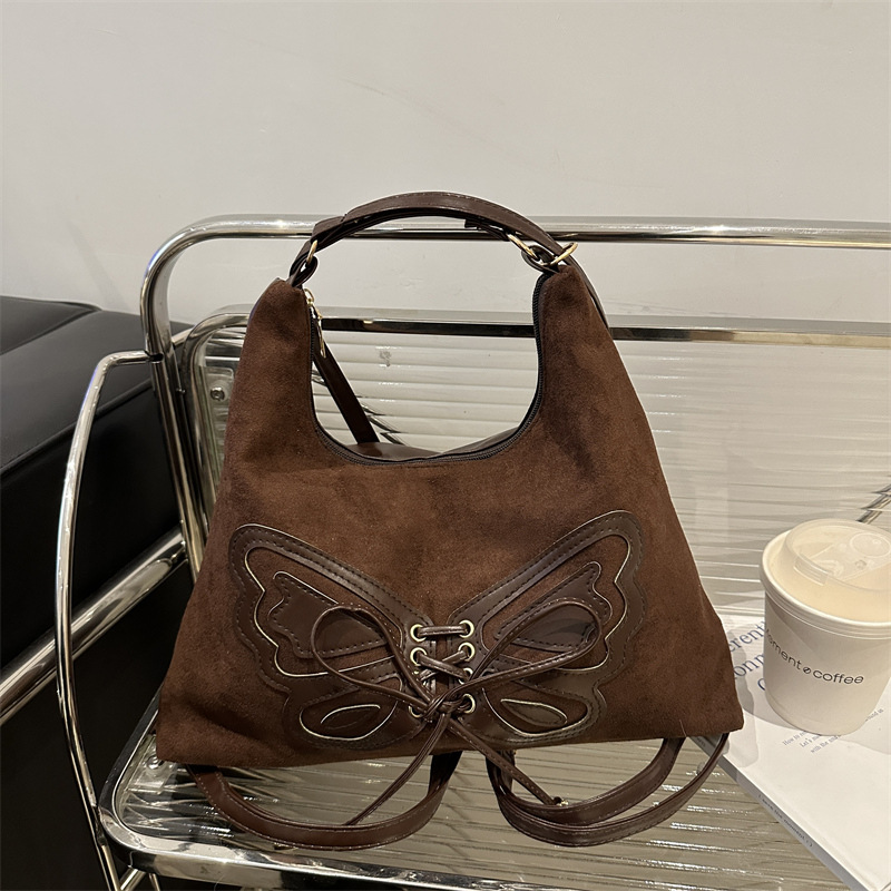 Bolsa de gran capacidad para mujeres 2024 invierno nueva moda de viaje de hombro mochila multiuso de un solo hombro cubo bolsa de mano