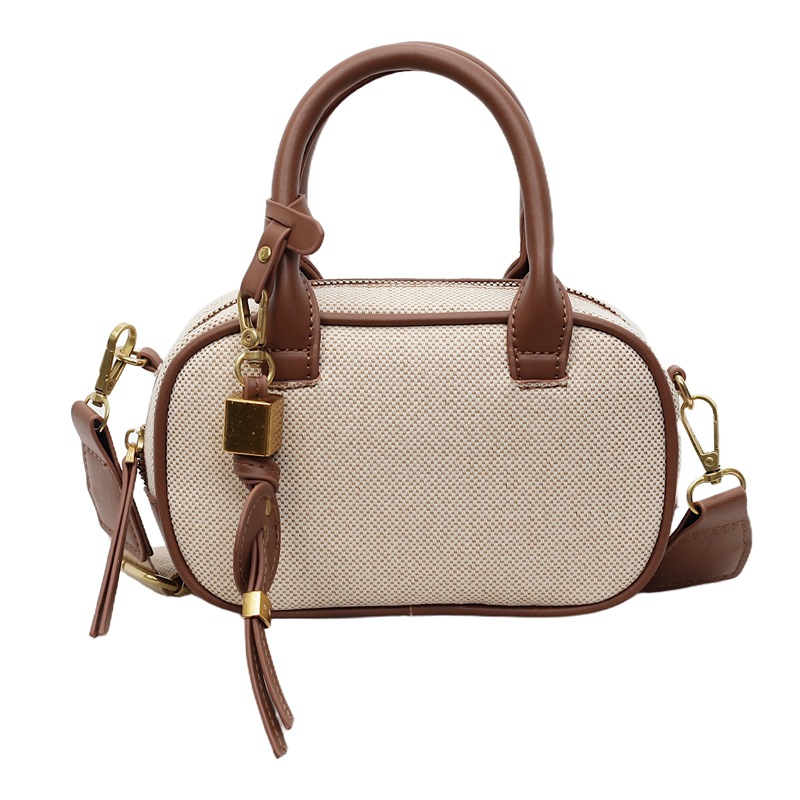 Bolsa de bolos de nicho coreano bolsas de bolos de mano lienzo colgante de color retro de alta calidad bolsas de hombro