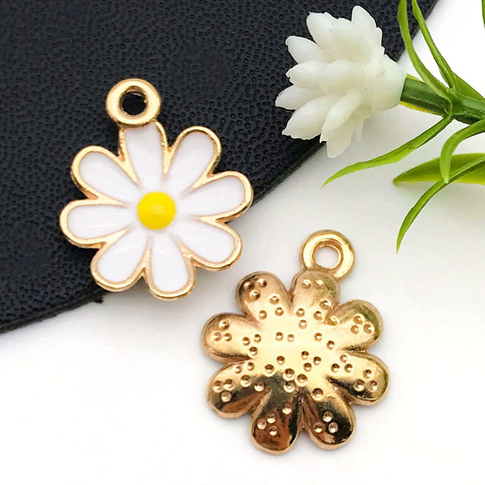 Colgantes de aleación con margarita y flor de cerezo esmaltadas