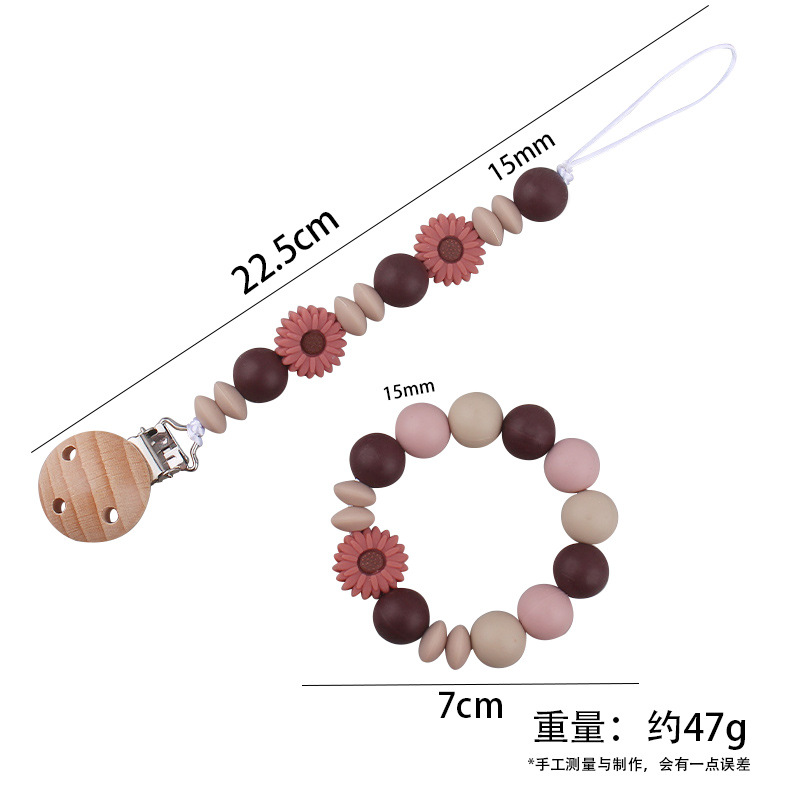 Nueva margarita pequeña cadena de tetina para calmar a los bebés anti-caída cadena creativa DIY pulsera de goma de diente dos conjuntos