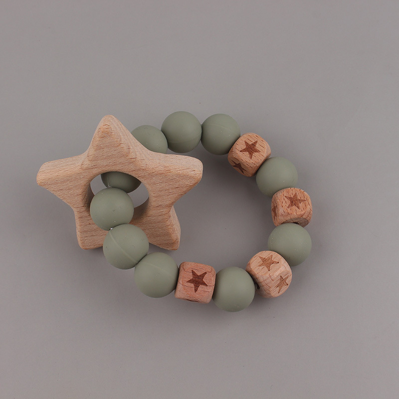 La pulsera de mordedor para bebé de juguete de haya 2025 puede morder el mordisco del bebé