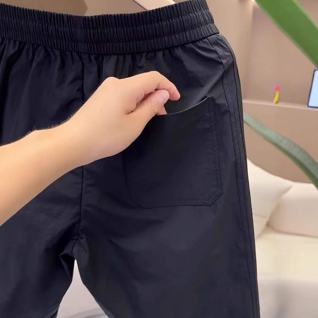 Pantalones cortos transpirables de verano de alta calidad, moda masculina, juveniles, pantalones casuales sueltos.