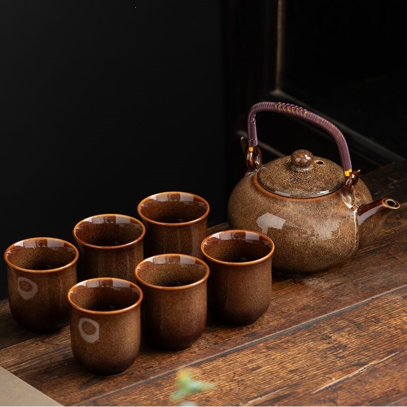 horno de alambre de dibujo de cerámica conjunto de tetera de té de siete cabezas tetera de viga doméstica sala de estar kung fu tetera de té de gran capacidad
