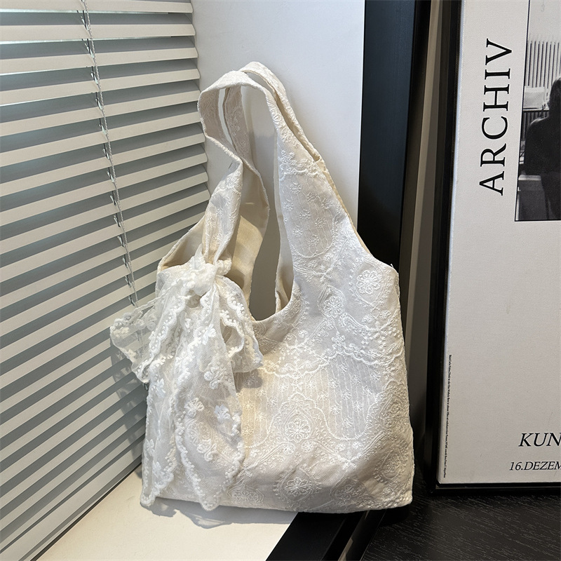 2025夏の新型の清新なシフォンの小さい花のリュックサックのレースの刺繍のキャンバスのカバンの手提げの脇の下の特のカバン|undefined