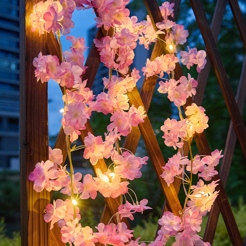 Cross-border LED solar-powered vine cherry blossom lights, green plant climbing vine garden decorative lights, balcony battery-powered copper wire lights