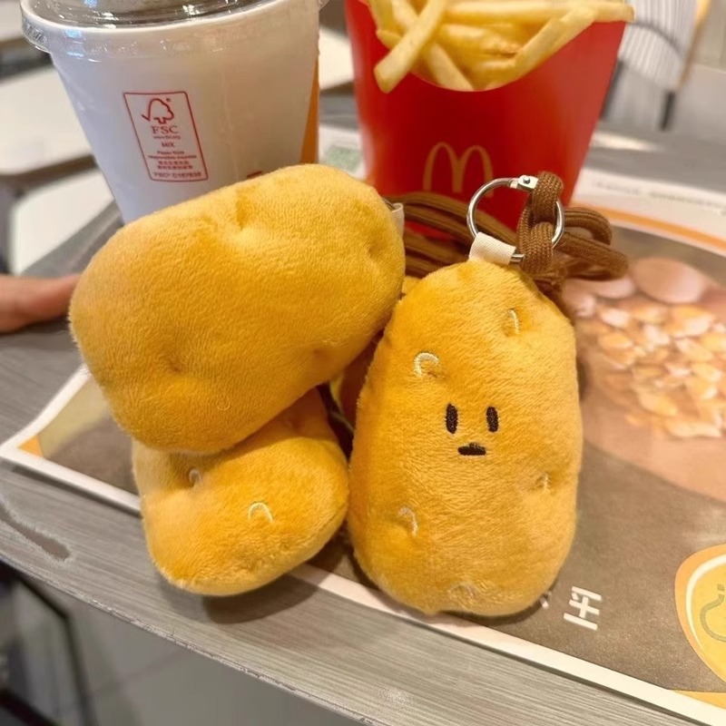 Harbin sur pequeña patata peluche colgante bolsos muñecas muñecas lindas muñecas máquina peluche al por mayor chirrido