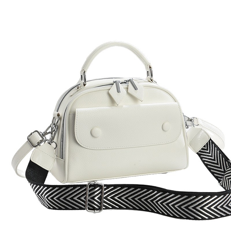 Temperamento sensación de bolso cuadrado 2025 nuevo tipo de bolso de hombro casual de moda de viaje bolsos de mano versátiles