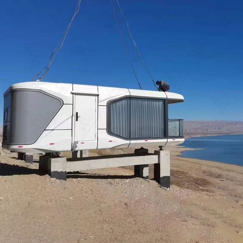 Casa de camping de campo de la cápsula del futuro estructura de acero de aleación de aluminio concha de gran cuadrado móvil alojamiento de la cápsula espacial fabricante