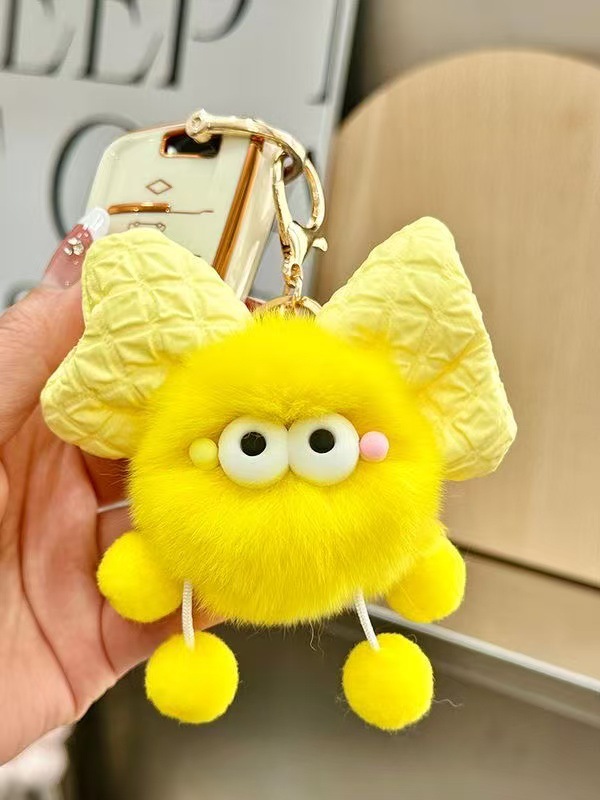 Nuevo estilo creativo imitación piel de conejo celebridad de Internet bowknot pequeña bola de carbón colgante niña corazón mochila escolar decoración coche llavero mujer