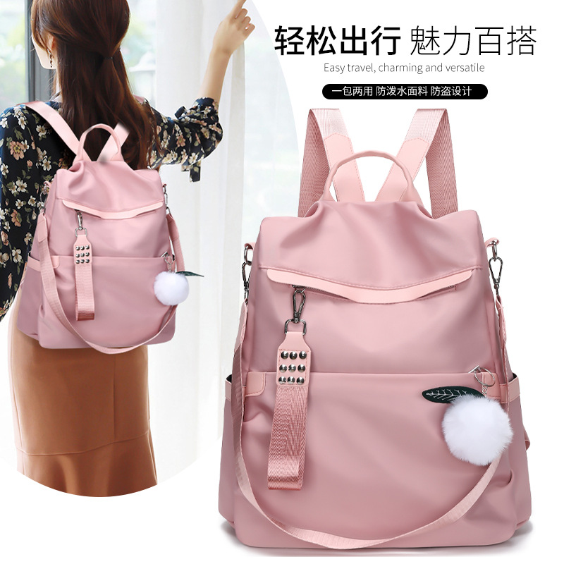 2024 nueva mochila Oxford casual para mujer, remache de moda, mochila de viaje de todo fósforo de color sólido al por mayor