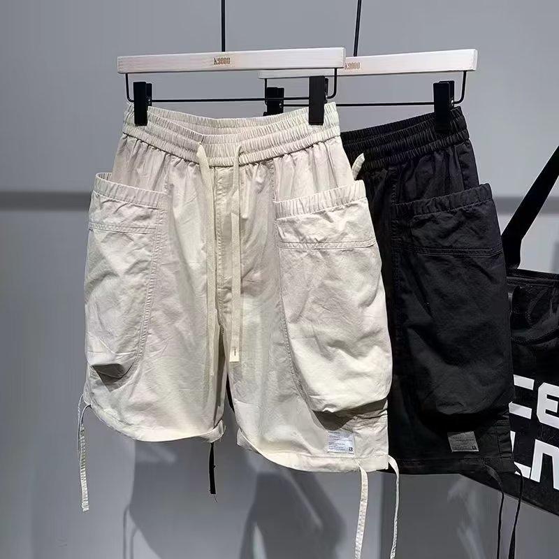 Monos de moda casuales de verano, pantalones de cinco puntos, pantalones cortos casuales microelásticos y transpirables para hombres, nuevos pantalones cortos multibolsillos