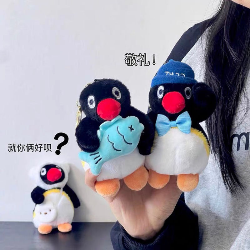 漫画のピンク色のペンギンバッグキーホルダー、ミニおもちゃ、クリエイティブなギフト、リボン付き|undefined