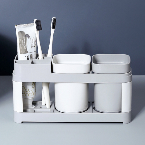 Vertical toothbrush and toothpaste holder set, bathroom mouthwash cup and toothpaste storage rack, home couple living room tooth accessories stand