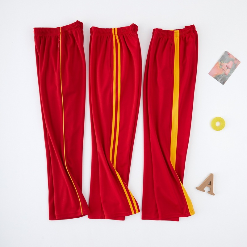 Bright Red Two-Stripe School Uniform Pants with Double Yellow Stripes for Elementary, Middle, and High School Students, Loose-Fitting Sports Pants for Spring and Summer Bright Red Two-Stripe School Uniform Pants with Double Yellow Stripes for Elementary, Middle, and High School Students, Loose-Fitting Sports Pants for Spring and Summer