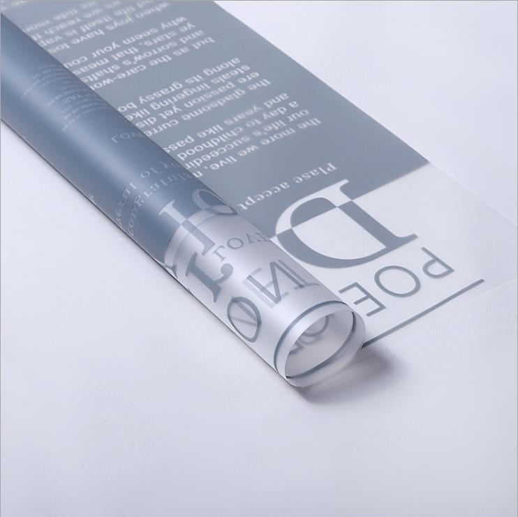 Fabricante de fiestas de flores al por mayor nuevo patrón de amor de San Valentín papel de embalaje de flores floristería translúcida ramo de flores