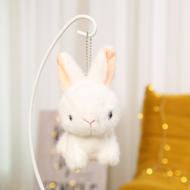 Lindo pequeño conejo blanco colgante de peluche de juguete muñeca de dibujos animados pequeño conejo muñeca de trapo máquina de agarre pequeña bolsa de muñeca adornos