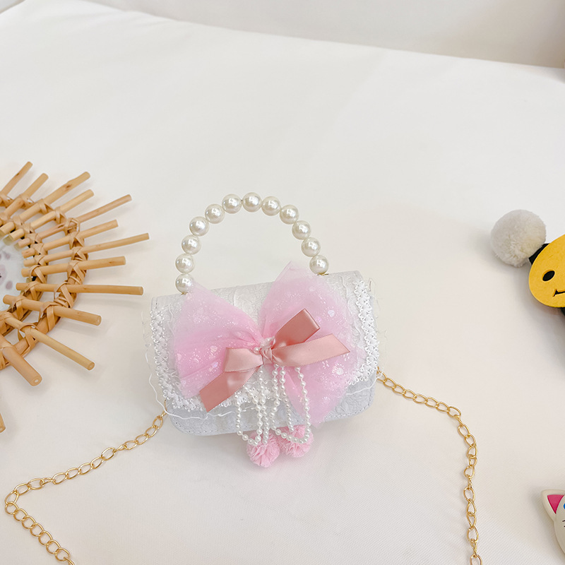 Nuevo arco niñas bolsa mensajero bolsa niños princesa Chanel estilo hombro bolsa bebé fuera moneda monedero bolsa