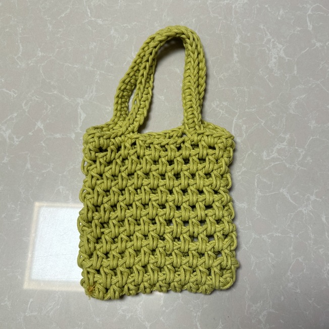 Redes de pesca perforadas tejidas a mano bolsos de teléfono móvil bolsos de moda casuales bolsos de playa de vacaciones de verano de punto