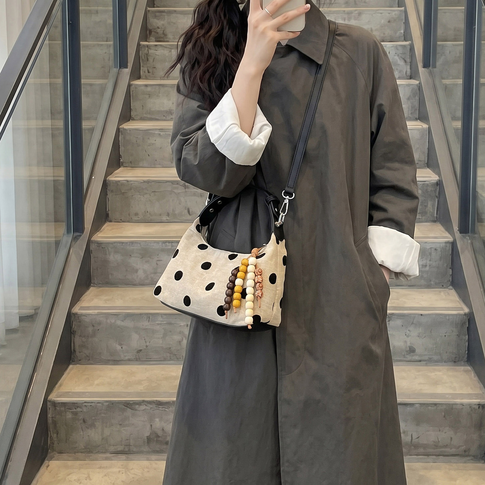 Bolsa de mano de lino ultra caliente, punto de onda, mujer 2026 nuevo nicho Zhongxiao universal, mochila de hombro para viajar
