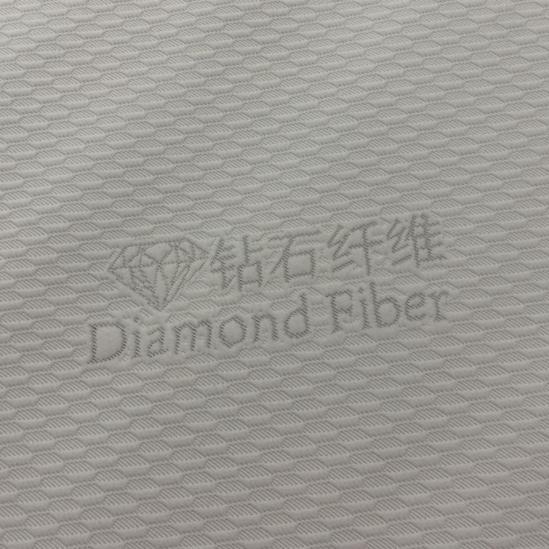 Fábrica de fuente de 180 gramos de fibra de diamante telas de colchón funcionales se pueden agregar fibra de diamante tejido Jacquard tela de colchón