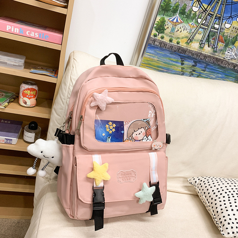 Mochilas escolares de moda bolsos de hombro para niñas estudiantes de primaria y secundaria sencillos paños transfronterizos ligeros bolsos de mano al por mayor bolsos de gran capacidad