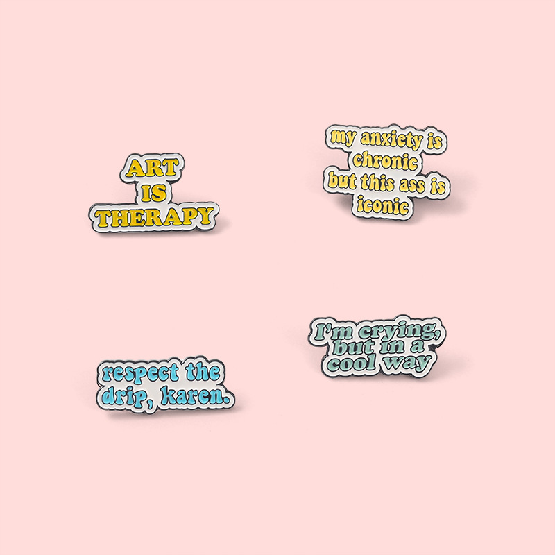 Venta caliente de Europa y América frase texto broche de arte es terapia broche de metal insignia bolsa de Ropa Accesorios