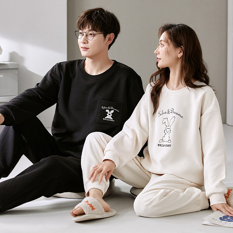 El otoño y el invierno sándwich de manga larga pareja pijamas engrosada de dibujos animados cuello redondo jersey de los hombres y las mujeres de ropa de casa caliente se puede usar fuera
