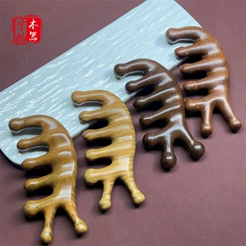 木质工艺品;经络保健器材;美发梳