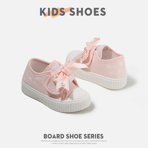 Spring and autumn children's canvas shoes with soft soles and soft surfaces, girls 'skate shoes, bow, pearl velcro, baby fashion