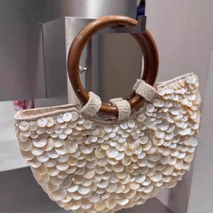 2025 primavera y verano nuevo estilo de alta sensación pura mano natural conchas bolsas de hadas bolsas portátiles bolsas de mujer pequeñas tendencia de personalidad crowdsourcing