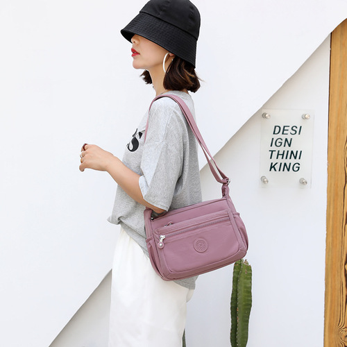 2024 New Nylon Casual Bag with Large Capacity, Crossbody and Hand-carry, Lightweight and Fashionable with Multiple Pockets, Ideal for Moms