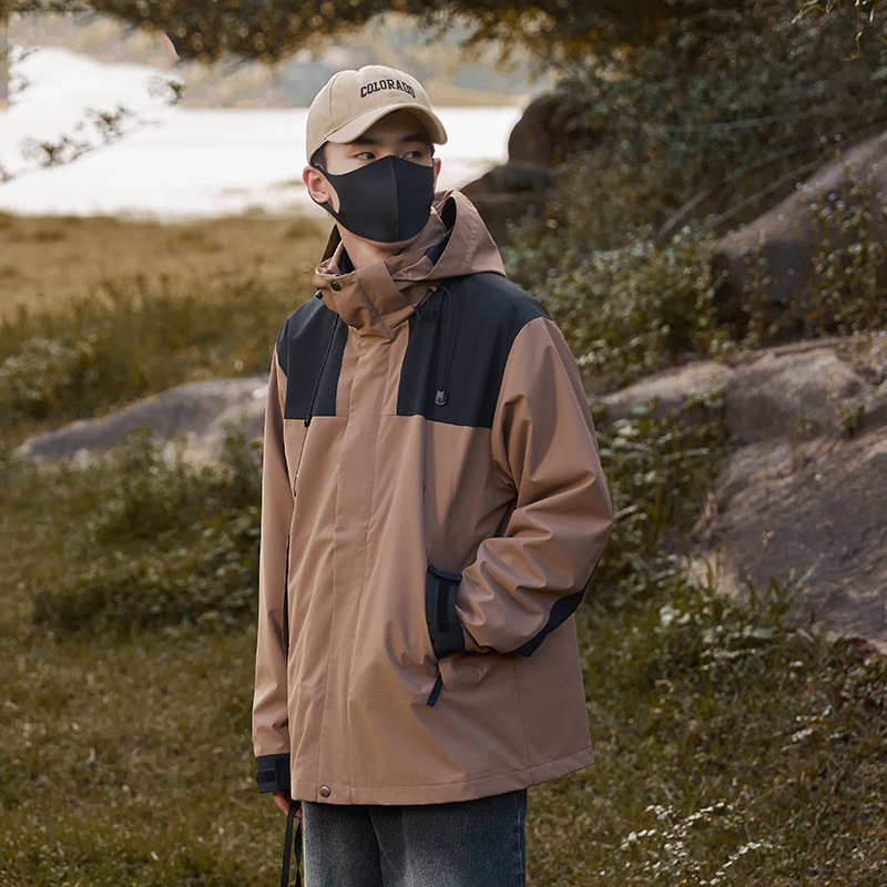 La misma marca al aire libre chaqueta de asalto hombre y mujer 3 en 1 abrigo desmontable 2025 nuevo a prueba de viento impermeable primavera y otoño