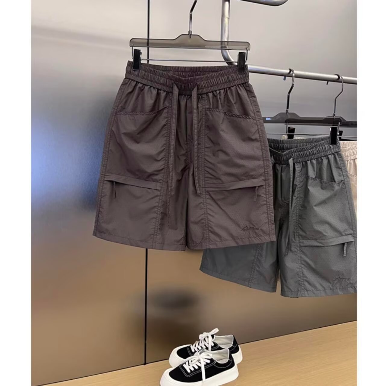 Popular Simple Summer Laser Perforated Tooling Shorts Large Pocket Breathable Mesh Pants Loose Sports Pants