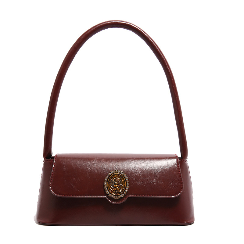 Bolsos retro de estilo extranjero para mujeres otoño y invierno 2024 nuevo estilo de moda bolsas de brazo de diseño de nicho bolsas de hombro