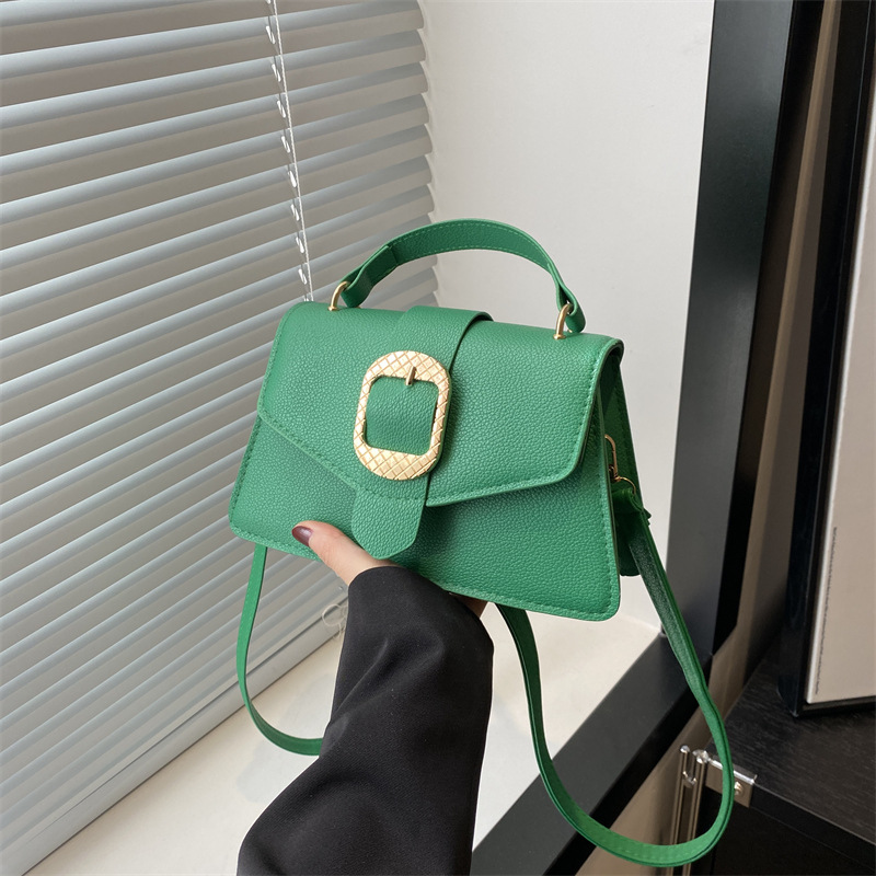 Bolso de primavera para mujeres, bolso de mano para viajar, simple bolso de hombro sólido.