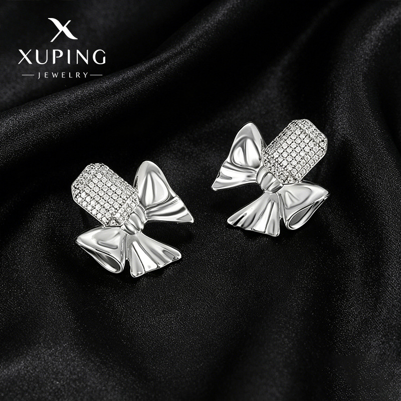 Xuping micro gemas artificiales aleación de cobre chapado arco blanco pernos de arco simple elegante temperamento auriculares al por mayor mujeres