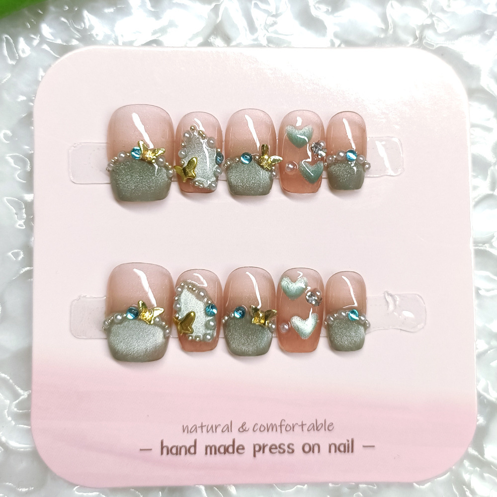 Manicura de Año Nuevo, 10 piezas de diamantes de perlas hechos a mano, arte de uñas portátil, parche de uñas Xiaohongshu, venta al por mayor