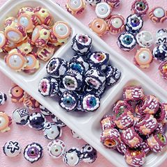 ディザトーンの爆発的な美ラード系重油手絵珠diy携帯チェーンのキーホルダーにビーズをつけた材料のアクセサリーがついている