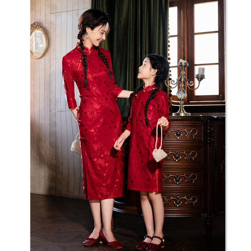 Red colored children's lace cheongsam