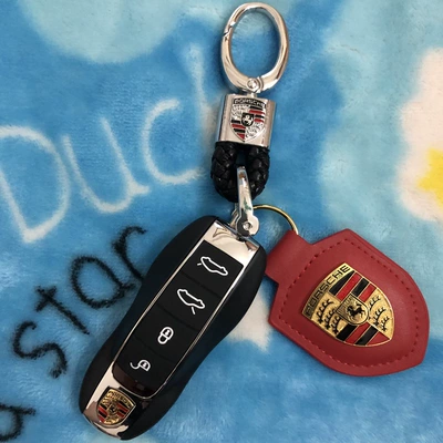 Mercedes-Benz Bmw Porsche — Car Keys - porsche-718-with-circuit-board-lights-up-open-teeth-and-buckle